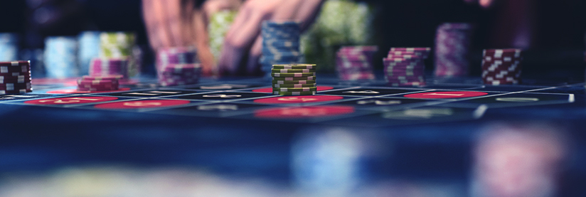 Roulette gaming table with stacked chips