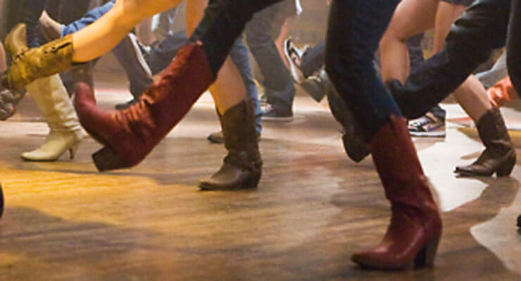 Close-up of Line Dancing Boots on dance floor