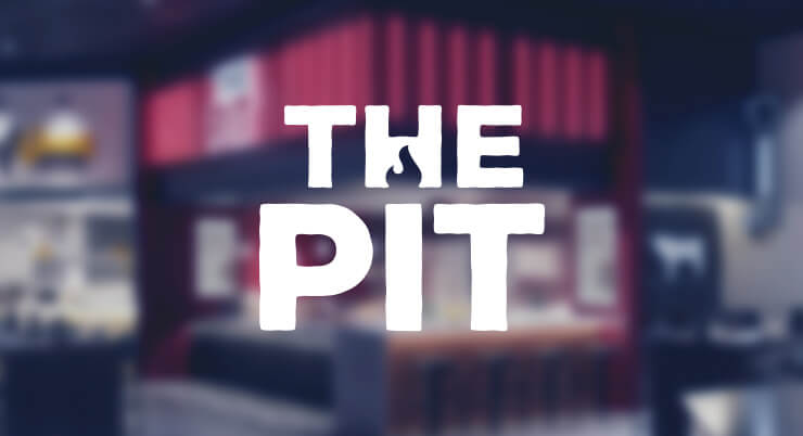 THE PIT logo over a blurred view of the barbecue counter.