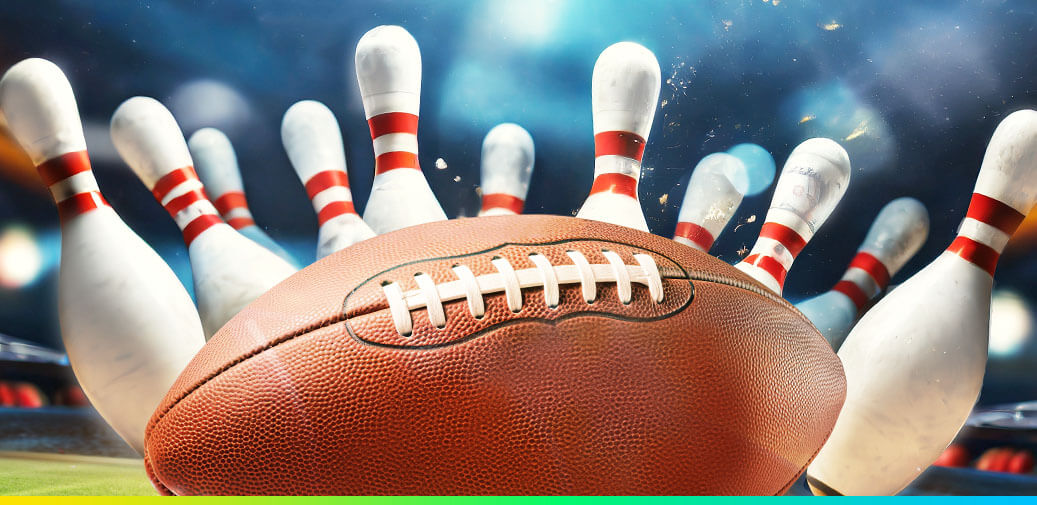 Football hitting bowling pins